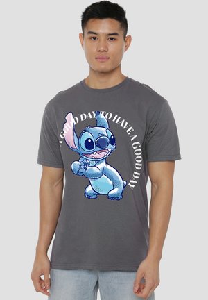 Gray cotton t-shirt featuring a blue cartoon character with large ears and expressive eyes, accompanied by the text "A GOOD DAY TO HAVE A GOOD DAY."