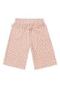 Shorts en coton légers avec une taille élastique, pr�ésentant un fond blanc et un motif floral corail. Coupe ample, longueur mi-cuisse.