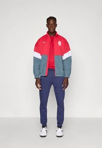 Mizuno PRE MATCH RETRO JACKET MONACO - Fanartikel - tango red