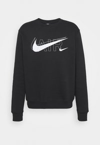 Musta collegepaita, joka on valmistettu puuvillasekoitteesta ja jossa on valkoinen Nike-logo sekä paksulla fontilla painettu "AIR"-teksti. Klassinen pyöreä kaulus ja resorit hihansuissa.