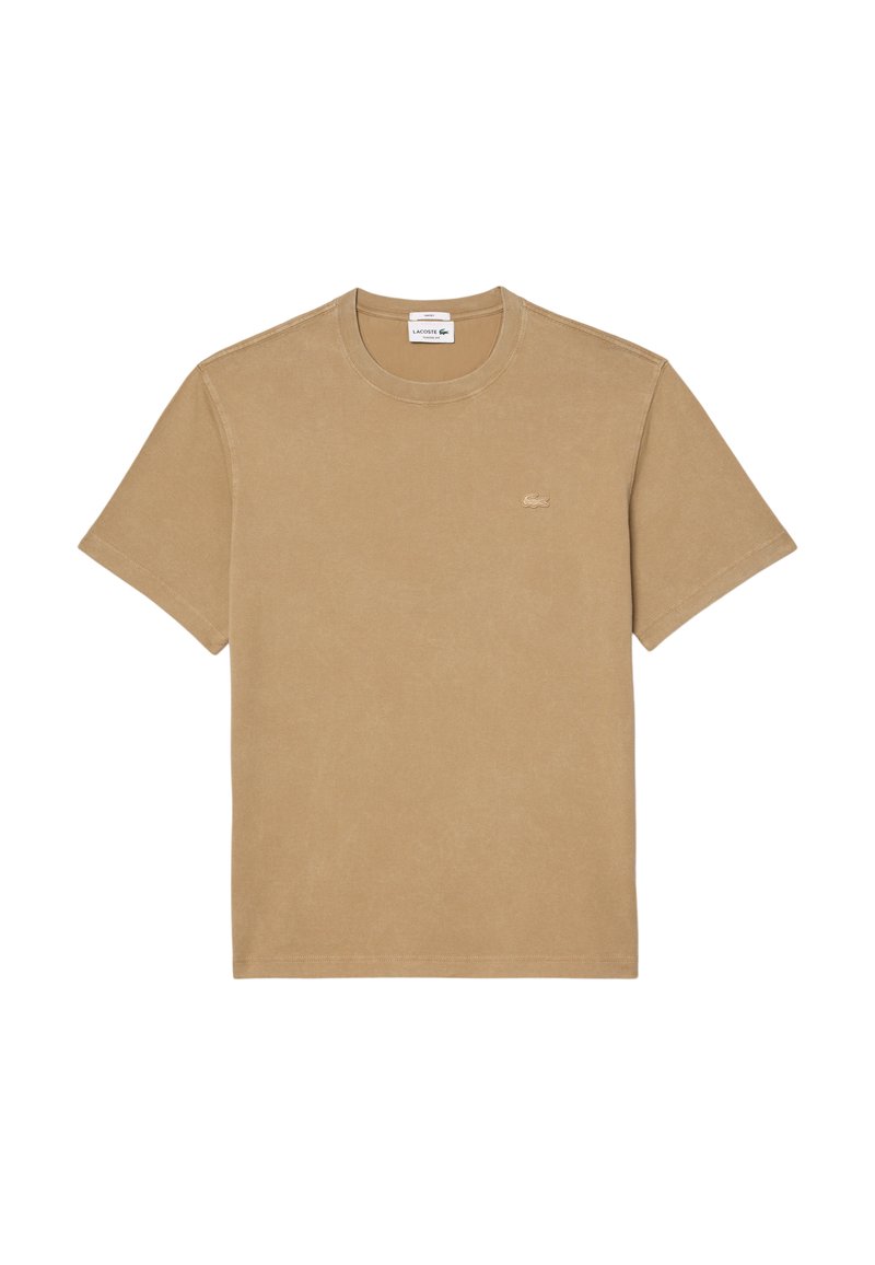 Beige Baumwoll-T-Shirt mit kurzen Ärmeln und Rundhalsausschnitt. Verfügt über ein kleines gesticktes Logo auf der Brust. Glatte Textur und lockere Passform.
