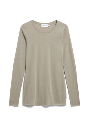 Long-sleeve, crew-neck top in light beige, made of soft fabric. Features a relaxed fit and a small brand tag on the hem.