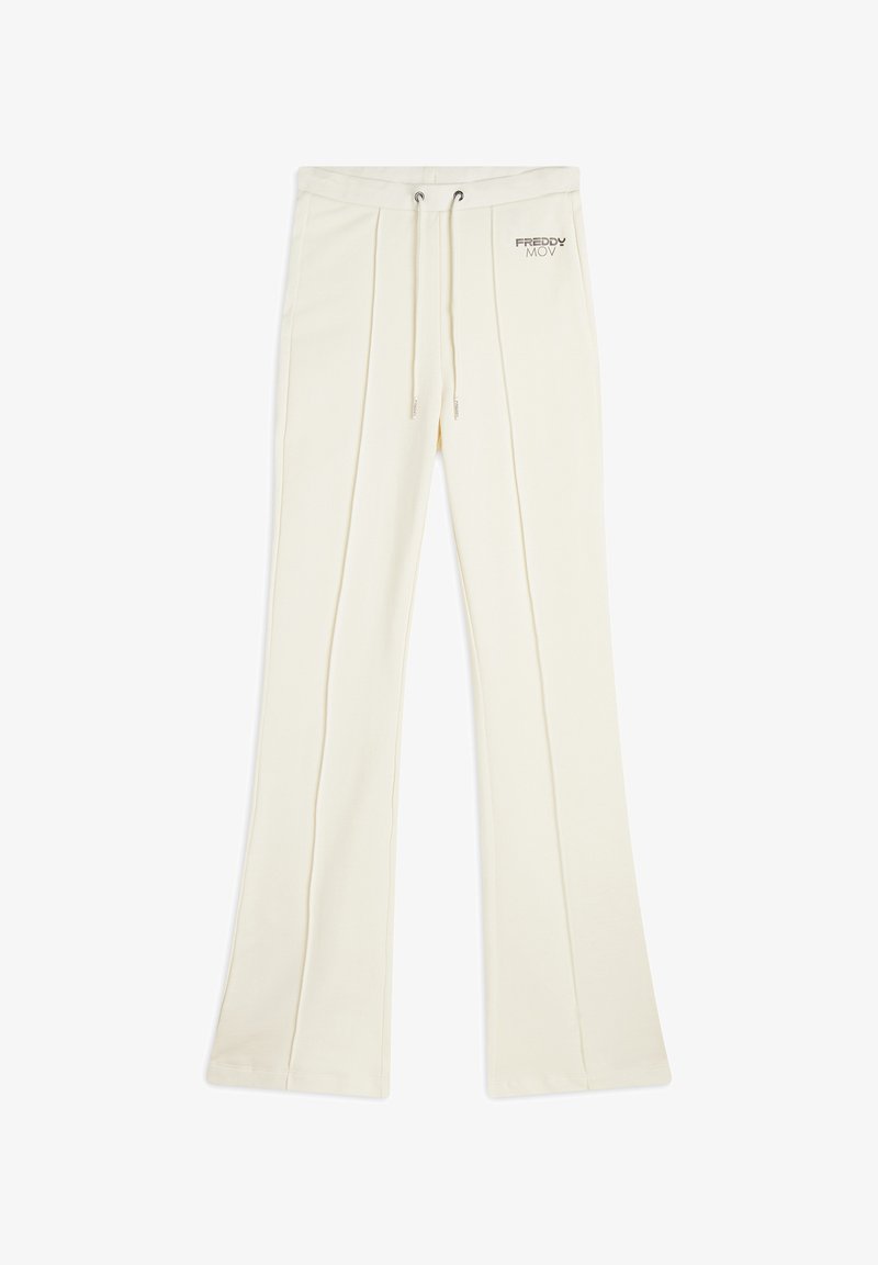 Pantalons de survêtement couleur crème avec taille à cordon, présentant des plis verticaux et un petit logo "FREDDY MOV" sur le côté gauche.