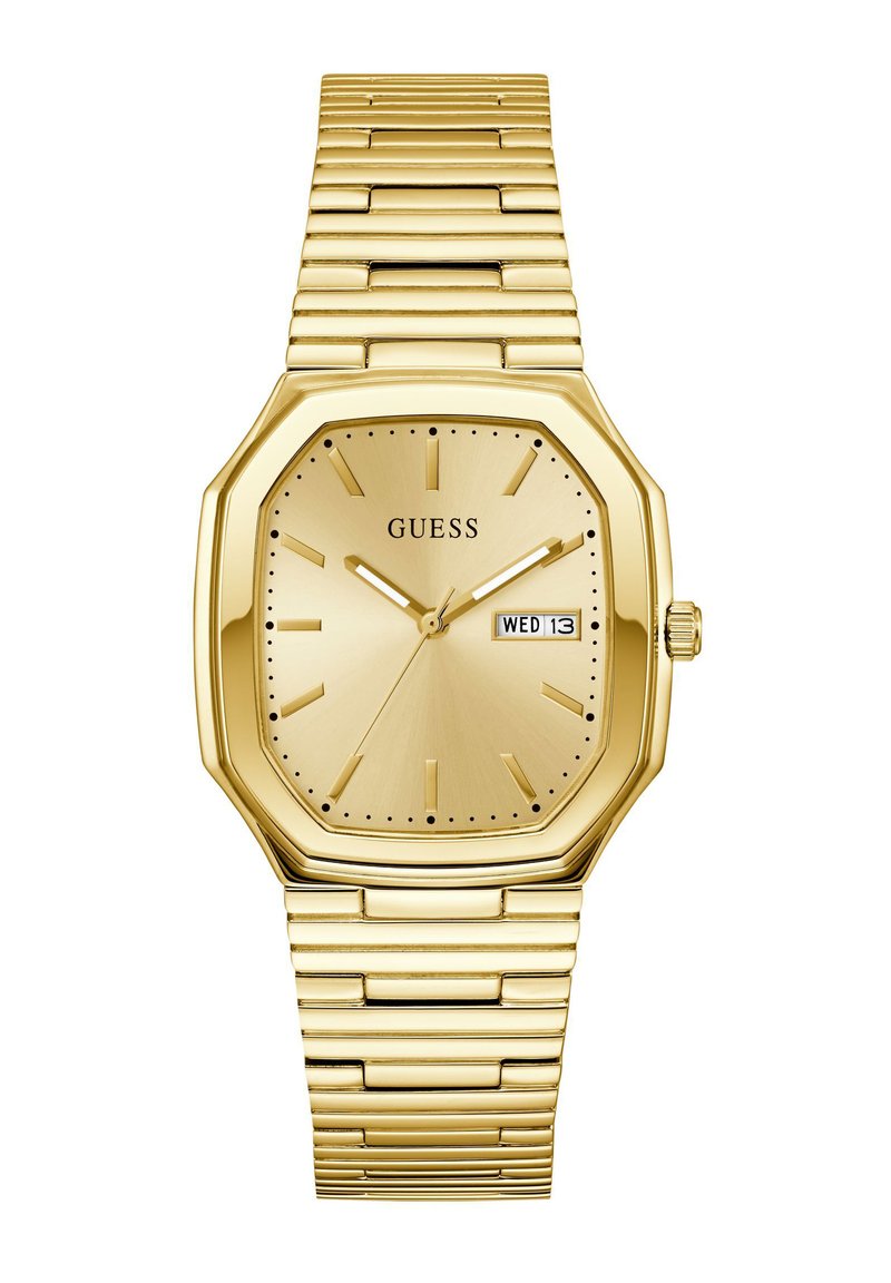 Montre octogonale dorée avec un bracelet métallique, dotée d'un cadran minimaliste, d'aiguilles dorées et d'un affichage de la date pour mercredi 13.