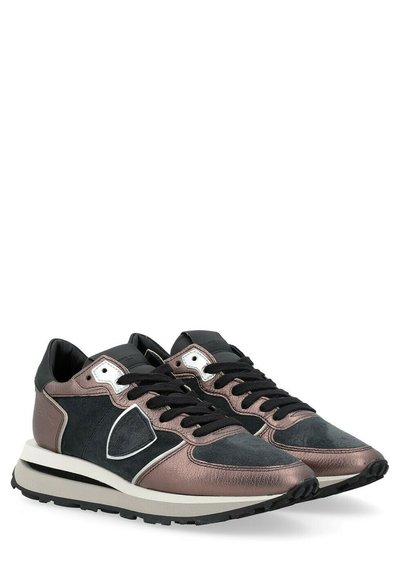 Metallic rose gold and black sneakers with a suede texture, featuring a thick sole, white accents, and black laces.