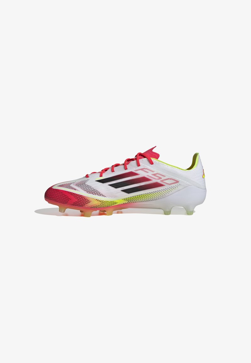 White soccer cleat with a red and yellow gradient design, mesh fabric, black stripes, and translucent studs. Classic lace-up closure.