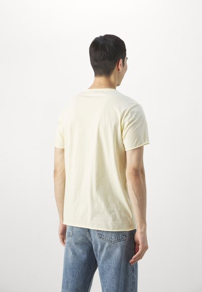 Filippa K ROLL NECK TEE - T-shirt basique - soft yellow