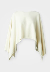 Off-white, tekstūruotas pončas su laisvu, dengiamos dizaino. Turi plačią iškirptę ir nelygų hemą, kuris pabrėžia jo plaukiojančią siluetą.
