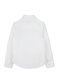 Witte blouse met lange mouwen van katoen, voorzien van een klassieke kraag, knoopmanchetten en een gebogen zoom met subtiele stikdetails.
