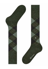 Calzini a motivi argyle verdi e neri con una finitura testurizzata, che presentano forme a diamante contrastanti e un piccolo dettaglio del logo.