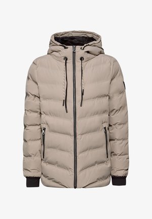 Veste matelassée beige avec capuche, cordons de serrage noirs, fermeture éclair frontale, poches latérales zippées et poignets élastiques noirs.