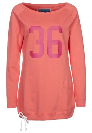 Długi rękaw, koralowa bluza dresowa z dużą różową liczbą "36" na przodzie, małą kieszenią przy krawędzi oraz białym sznurkiem po boku.