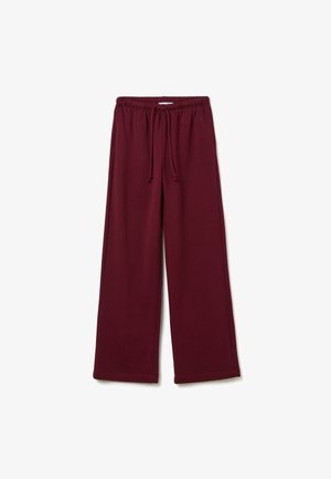 Pantaloni larghi bordeaux realizzati in un morbido tessuto con vita elastica e coulisse regolabile, caratterizzati da dettagli di orlo cuciti.