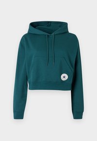 Τελική cropped φούτερ με μακριά μανίκια, μπροστινή τσέπη καγκουρό, ρυθμιζόμενο κουκούλι με κορδόνι και λογότυπο Converse All Star στην τσέπη.