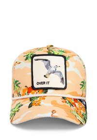 Cap with a peach floral pattern, featuring a black-bordered square patch displaying an embroidered seagull and the text "OVER IT."