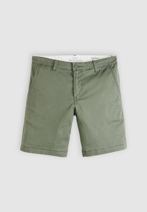 Olive green men's chino shorts with front pockets, belt loops, buttoned waist, flat front, and standard fit on a plain background.