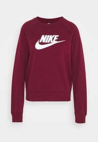 Vinsvarts sweatshirt med en vit Nike-logga. Har en rund halsringning och ribbade ärmslut, tillverkad av mjukt material med en avslappnad passform.