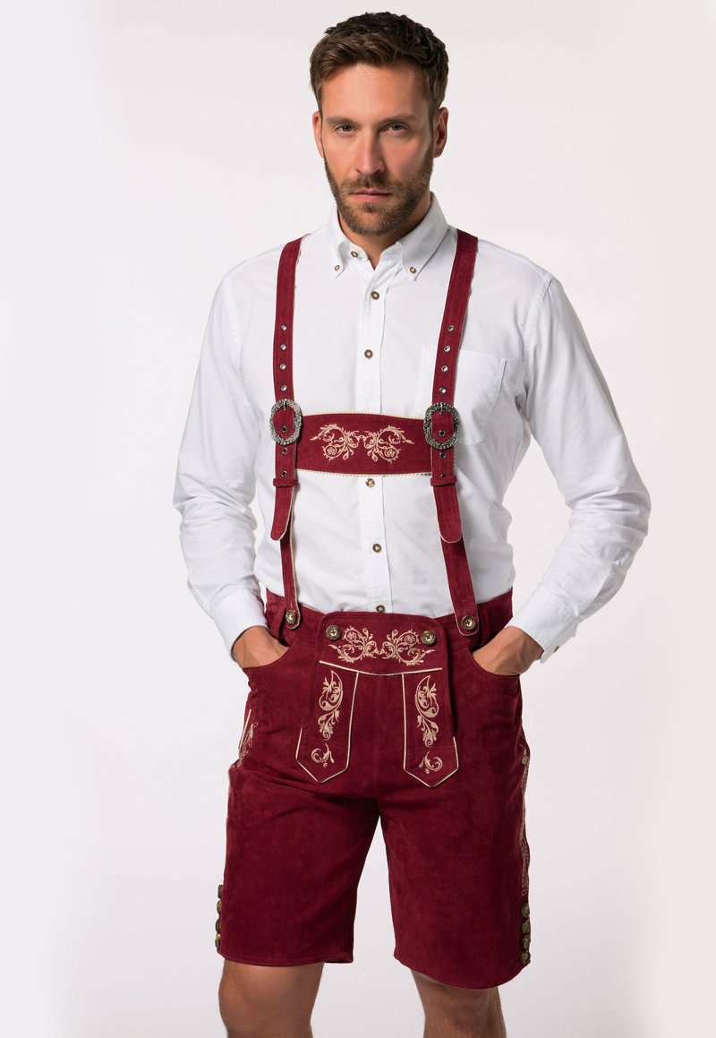 Bourgondische lederhosen van suede met decoratieve gouden borduursels, voorzien van verstelbare schouderbanden en zij knoopsluitingen.