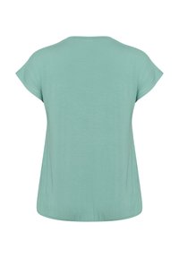 Mint green short-sleeve top with a relaxed fit, round neckline, and smooth, lightweight texture. No visible patterns or accents.