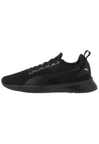 Scarpe sportive nere con una parte superiore in mesh traspirante, dettagli testurizzati, suola ammortizzata e un linguetta sul tallone per facilitarne l'indossamento.