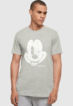 Gray cotton t-shirt featuring a distressed white graphic of Mickey Mouse's face with a playful expression, short sleeves, and crew neck.