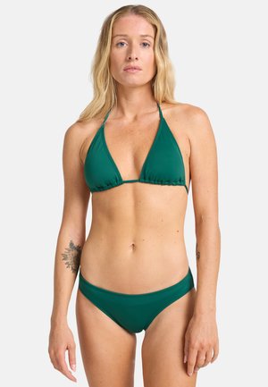 Green bikini set with triangular bra and matching low-rise brief. Smooth fabric with a matte finish, adjustable ties on the top, no patterns or accents.