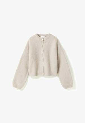 Bēša dūrainā adīta kardigāna ar garām pūšļveida piedurknēm, apaļu izgriezumu un priekšpuses pogu aizdari.