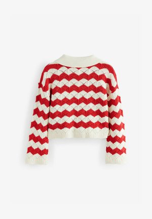 Horgolt crop pulóver piros és fehér cikcakk mintával, bordázott nyakkivágással és mandzsettával, texturált anyaggal és hosszú ujjakkal.