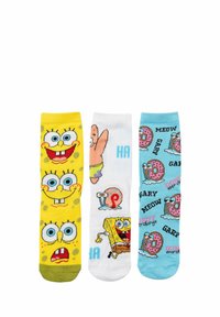 Tre paia di calzini con motivi di cartoni animati. Sinistra: giallo con facce di SpongeBob. Centro: bianco con SpongeBob e Patrick. Destra: blu con Gary e ciambelle.
