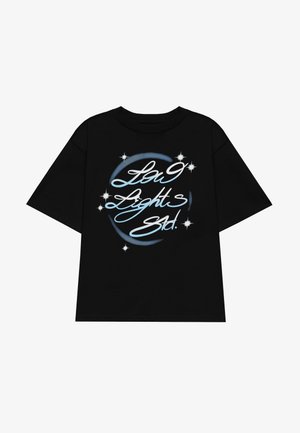 Black short-sleeve t-shirt featuring white and blue graphic text "La9 Lights Std." with star accents and circular design elements.