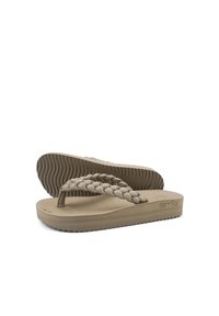 Tan flip-flop sandals with braided straps, soft textured footbed, and patterned rubber sole for traction. Brand name embossed on side.