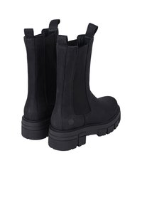 Black ankle boots with elastic side panels, textured suede material, thick rubber sole, and pull tabs on the upper for easy wear.