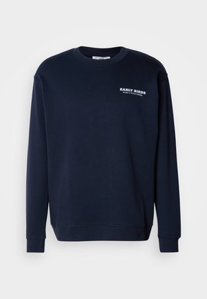 Navy sweatshirt made of cotton blend fabric. Features crew neckline, long sleeves, ribbed cuffs, and "EARLY BIRDS" print on chest.