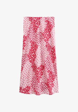 Gonna a fantasia floreale con vivaci fiori rossi su uno sfondo bianco. Realizzata in tessuto leggero con un design fluido.