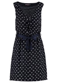Marinblå ärmlös klänning med vita triangulära mönster, V-ringning, knappar och ett matchande bälte i midjan. Slät tygstruktur.