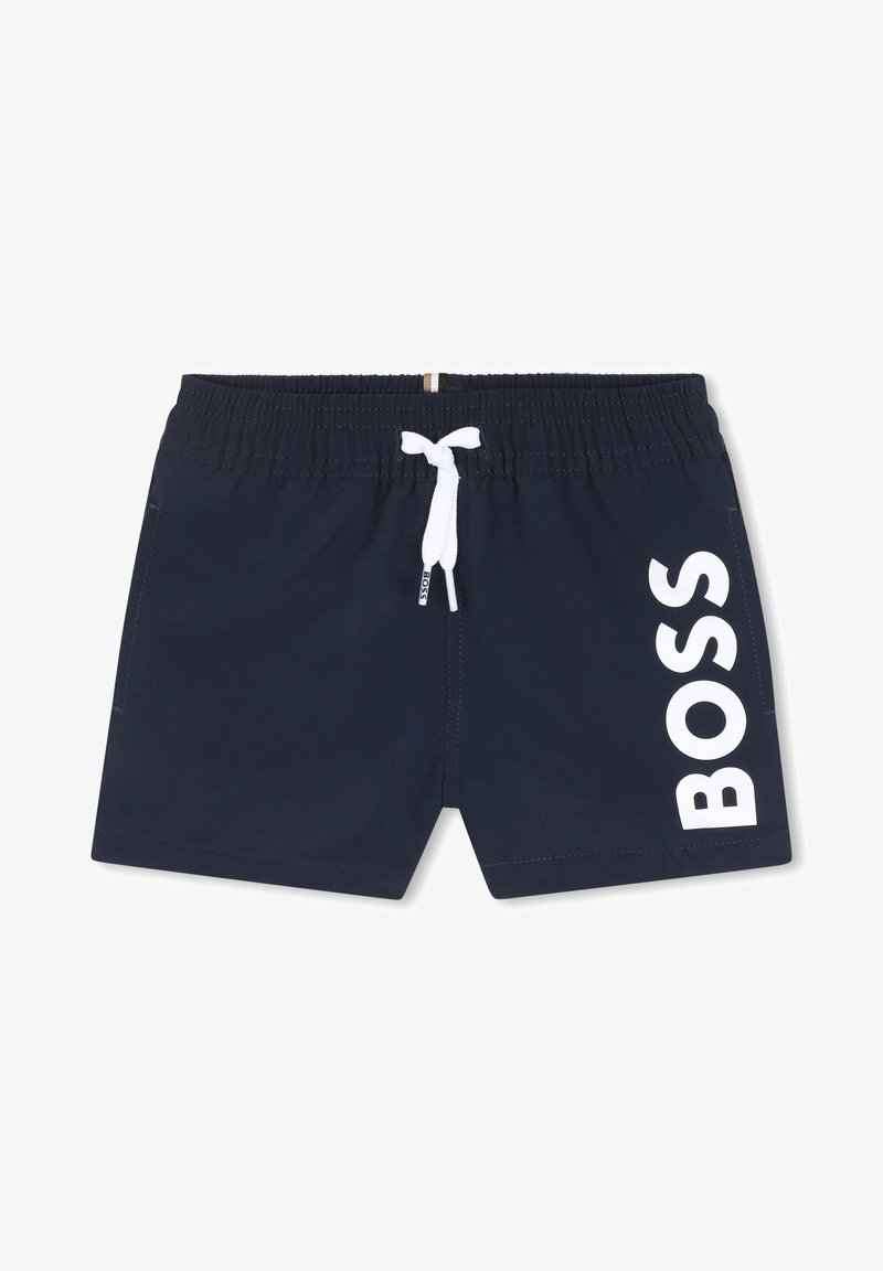 Pantaloni da bagno blu navy con vita elastica, coulisse bianca e logo "BOSS" bianco ben visibile sul lato sinistro. Materiale morbido e leggero.