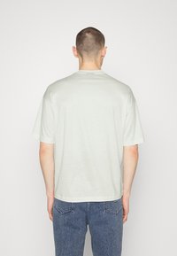 Emporio Armani T-shirt med print - white