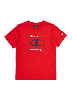 T-shirt in cotone rosso con logo Champion in bianco e nero centrato sulla parte anteriore, maniche corte e design con scollatura rotonda.