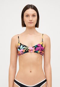 Floral print bikini top with multicolored flowers on a black background, featuring thin straps and a simple, triangular shape.