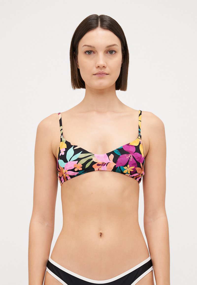 Floral print bikini top with multicolored flowers on a black background, featuring thin straps and a simple, triangular shape.