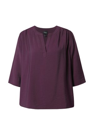 Blusa viola a maniche corte con scollatura a V, caratterizzata da leggeri arricciamenti alle cuciture delle spalle e una vestibilità rilassata. Realizzata in tessuto leggero.