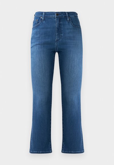 Tumši zila džinsu bikses ar platu apakšu un augsto jostasvietu, piecu kabatu dizains un redzamas šuves. Gluda tekstūra, nedaudz izbalējusi vietās.