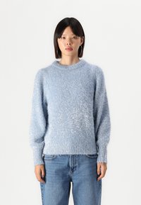 Light blue, fuzzy sweater with a round neckline and long sleeves. Features a textured finish with slight shimmer and ribbed hem.