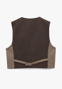 Brązowa bezrękawnik z wstawkami w kratkę po bokach oraz detalem paska na plecach. Gładka tekstura z dopasowanym krojem i wyraźną sylwetką.