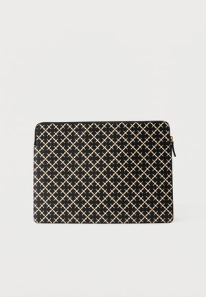 Black rectangular zippered pouch with beige lattice and floral pattern, textured surface, and gold zipper pull tab on the right side.