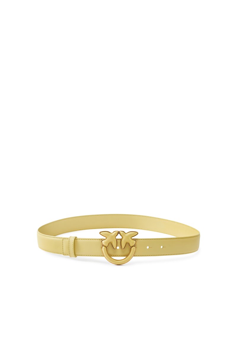 Yellow leather belt with a wide strap and a distinctive gold-tone buckle shaped like two stylized palm trees. Lightweight and smooth texture.