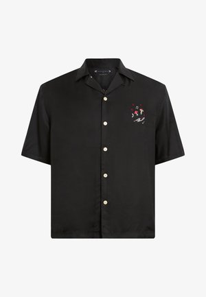 Svart kortärmad skjorta i slät tyg, med knapp-up front och en färgglad broderad design på vänster bröstområde.