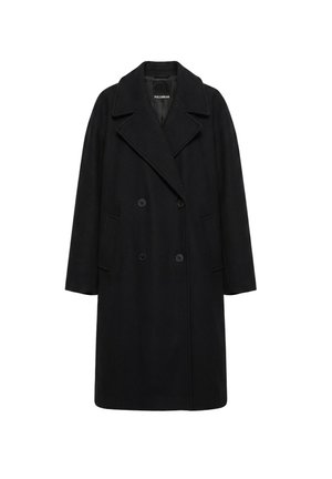 Long manteau noir croisé avec larges revers et deux poches latérales, présenté sur fond blanc.