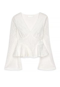 Weißes Peplum-Oberteil mit tiefem V-Ausschnitt und langen, ausladenden Ärmeln. Bestickt mit floralem Muster, aus leichtem, strukturiertem Stoff gefertigt.