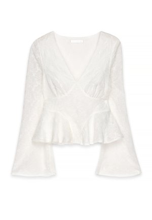 Biały top peplum z głębokim dekoltem w kształcie V i długimi, rozszerzającymi się rękawami. Haftowany wzór kwiatowy na całej powierzchni, wykonany z lekkiego, teksturowanego materiału.